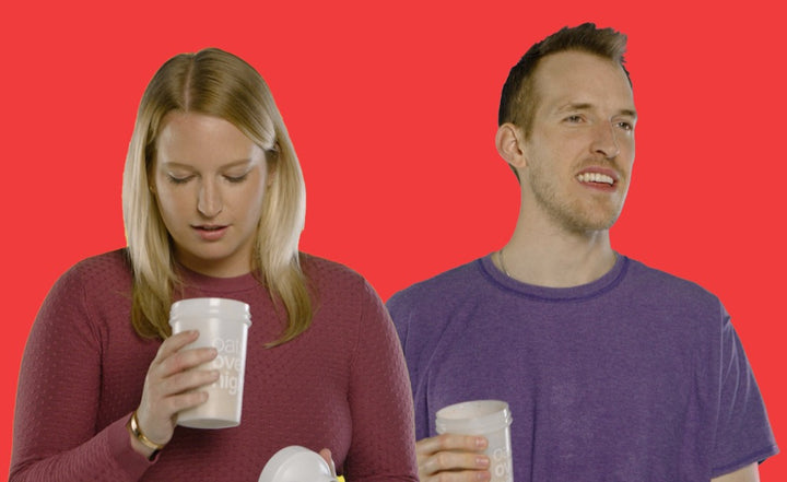 Two people trying a spoon-free breakfast drink